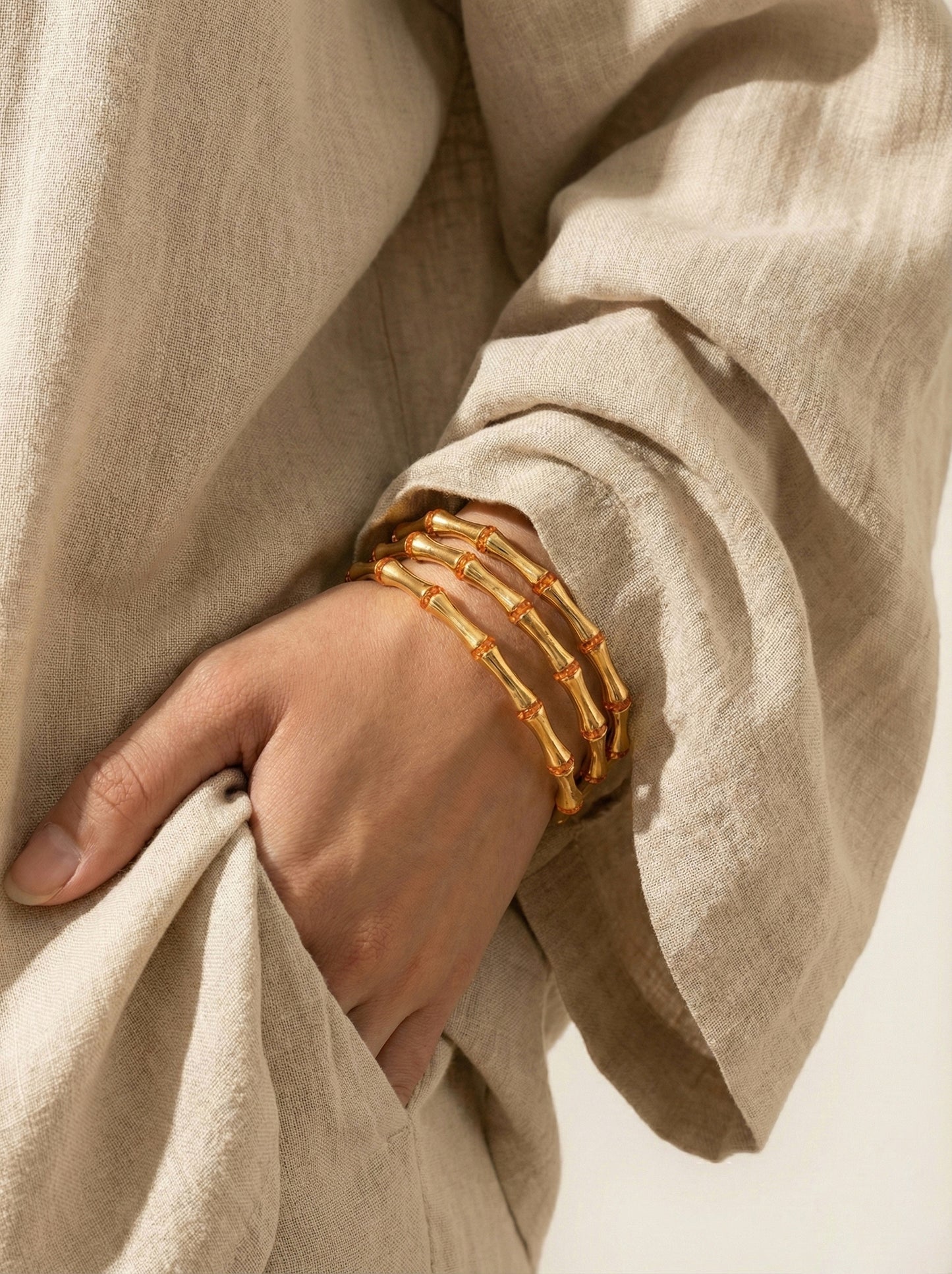 The Lyra Orange segmented bangle